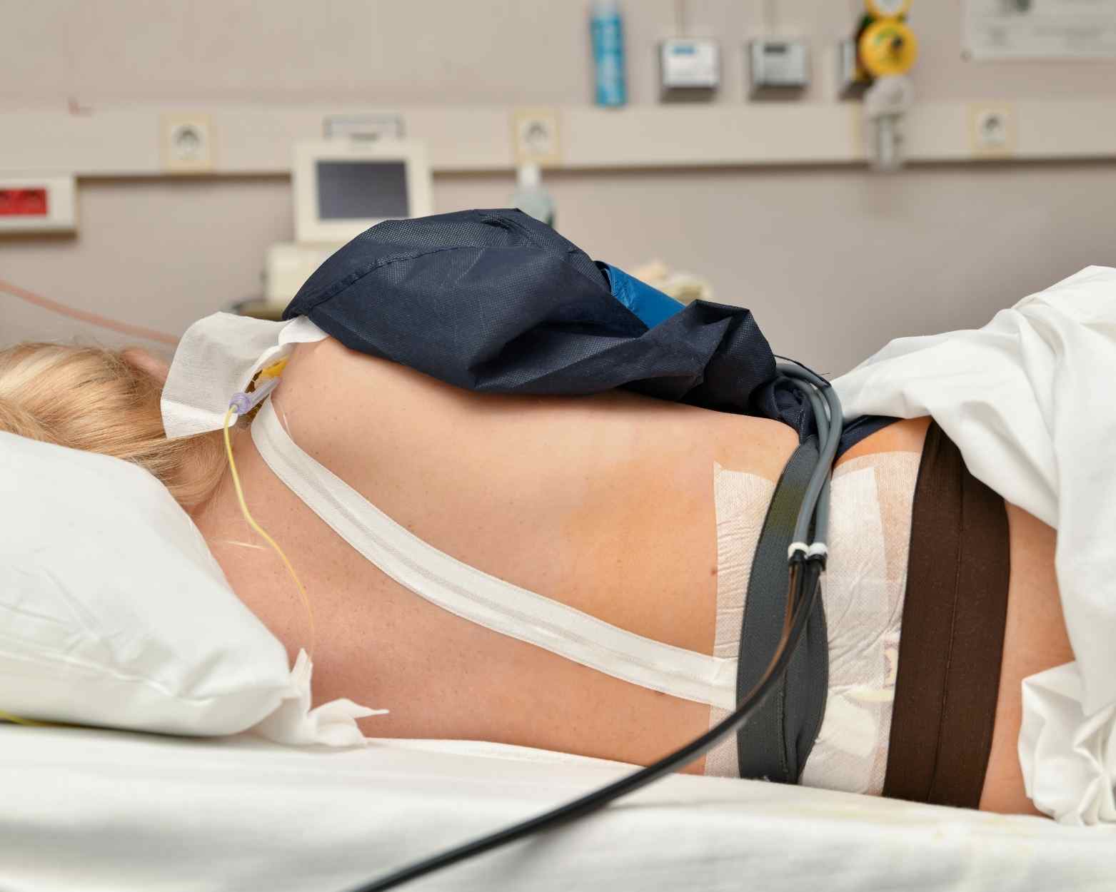 A woman with an epidural using different labor positions.