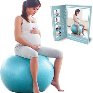 A pregnant woman holding her belly and bouncing on a blue pregnancy yoga ball.