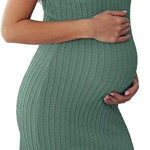 A pregnant woman wearing a green rib knit maternity dress.